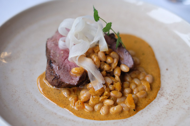 Lamb Rump with Haricot Beans, Raisin Puree, Fermented Salsify, Zucchini, and Piquillo Pepper. Darley's Restaurant at Lilianfels Resort & Spa in the Blue Mountains. Darley's Restaurant review by White Caviar Life.