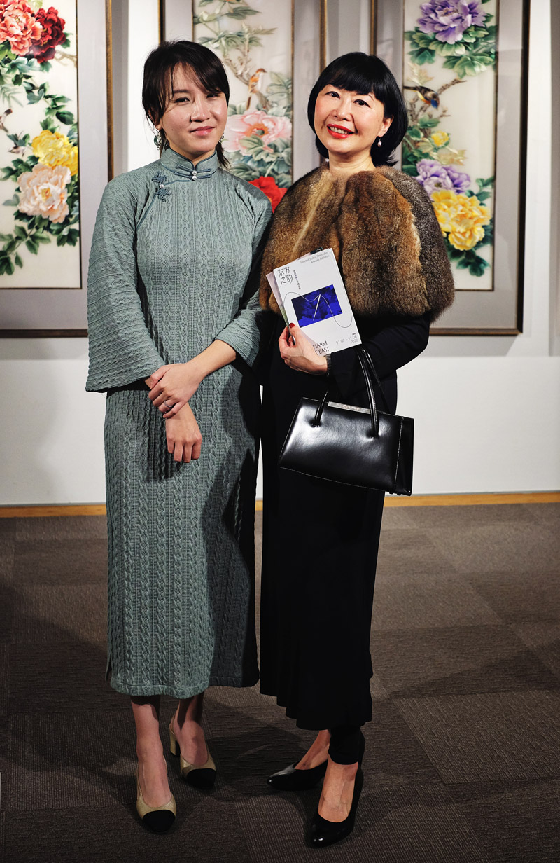 Writer Vivienne She and Raphi Wei, the founder of Yue Yuan Gallery & Decor at the opening night of The Charm of the East - Selected Suzhou Embroidery Artworks Exhibition at China Cultural Centre in Sydney.